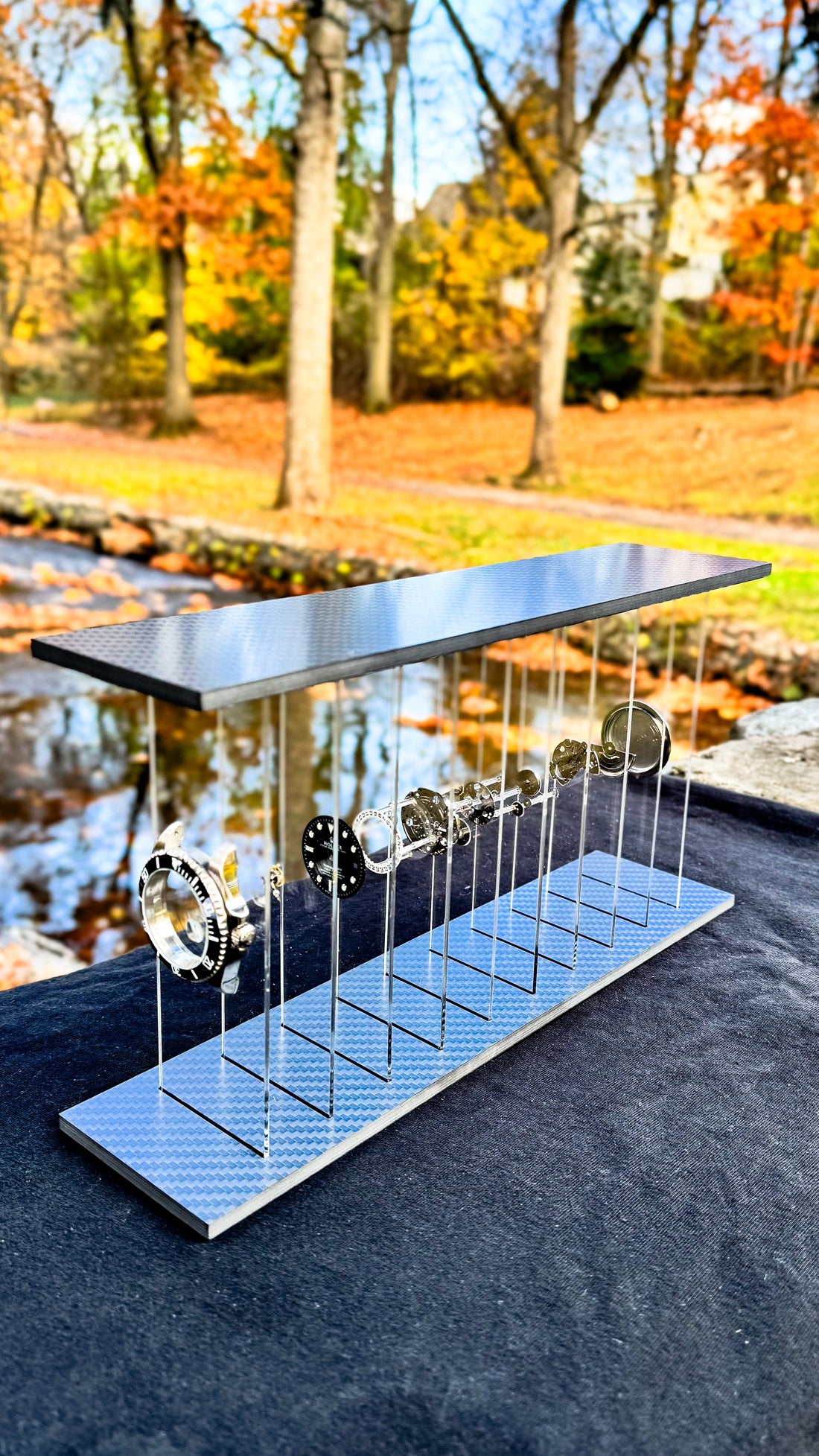 Deconstructed watch display black sub  edition with floating mechanical parts suspended in clear acrylic layers ships from NYC USA stock 